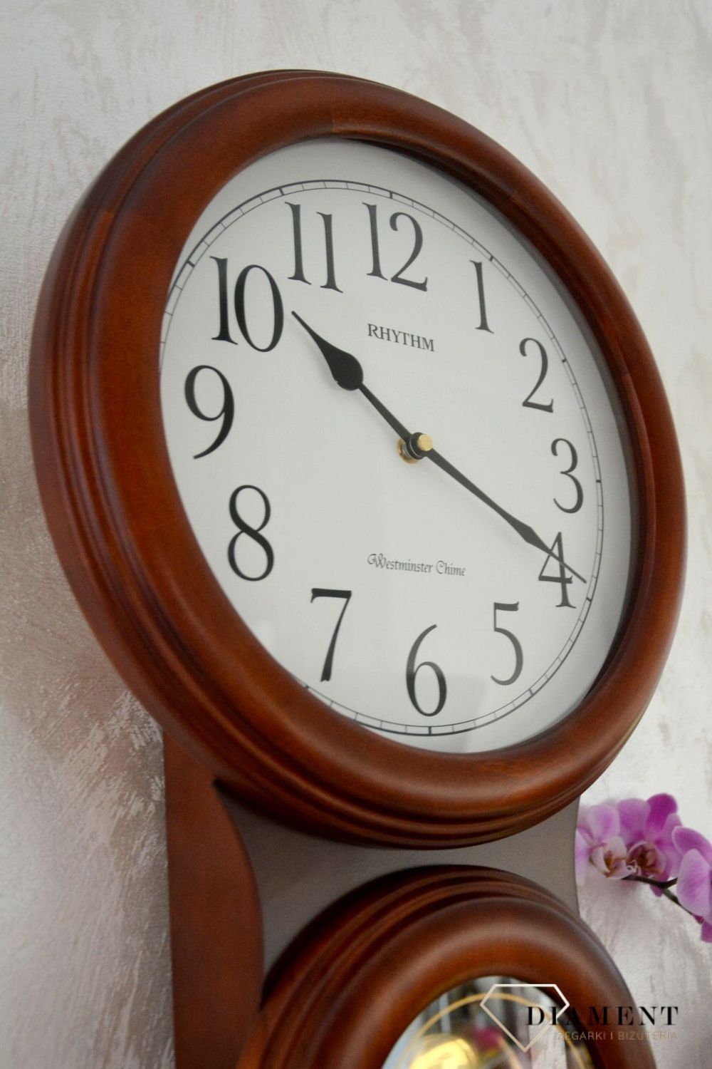 Zegar ścienny Rhythm drewniany z wahadłem CMJ575NR06ybnfgy.jpg
