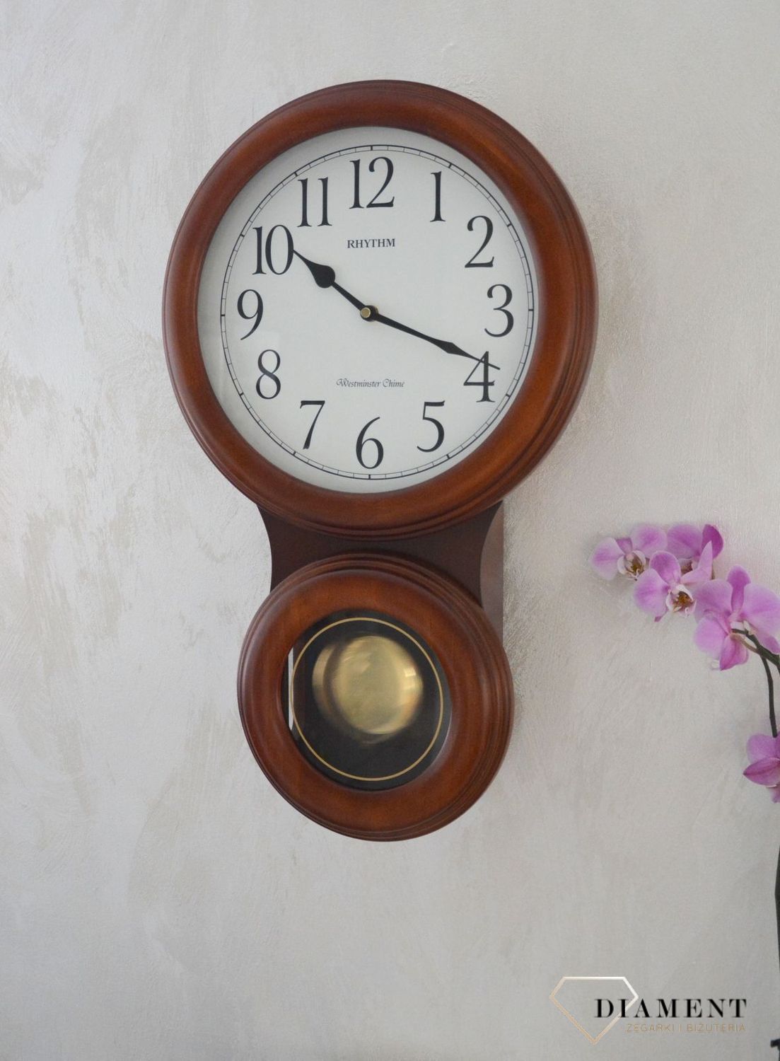 Zegar ścienny Rhythm drewniany z wahadłem CMJ575NR06ybnfgy.jpg