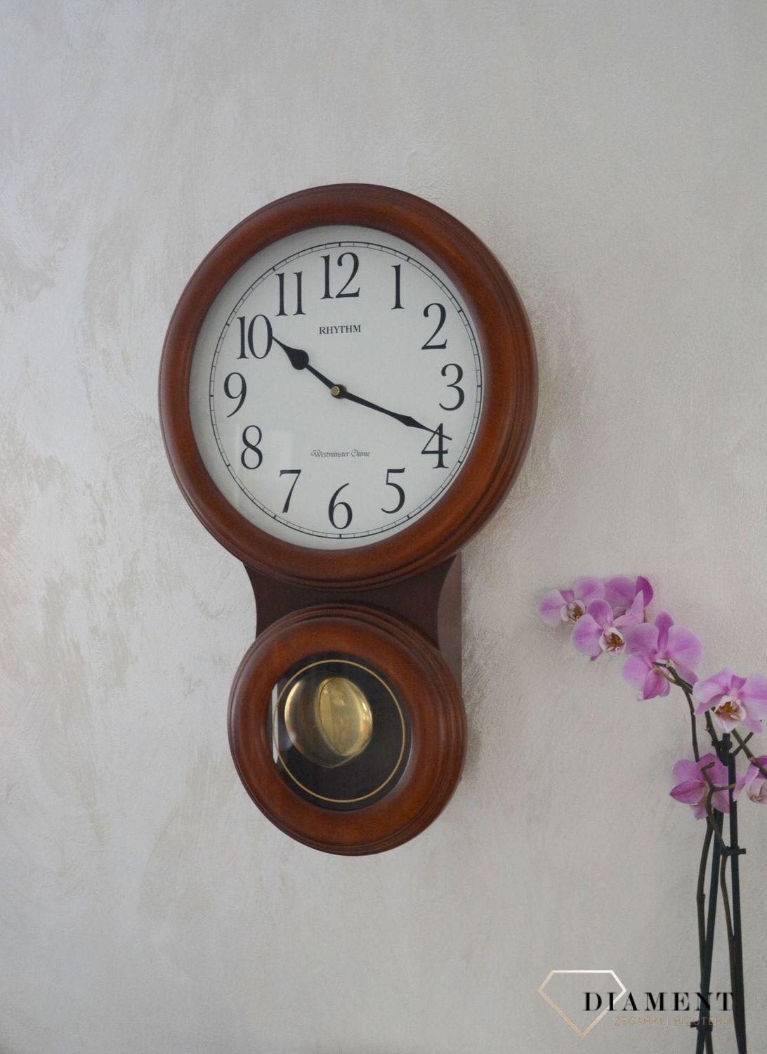 Zegar ścienny Rhythm drewniany z wahadłem CMJ575NR06ybnfgy.jpg