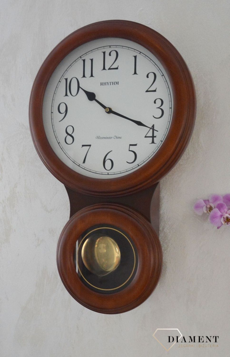 Zegar ścienny Rhythm drewniany z wahadłem CMJ575NR06ybnfgy.jpg