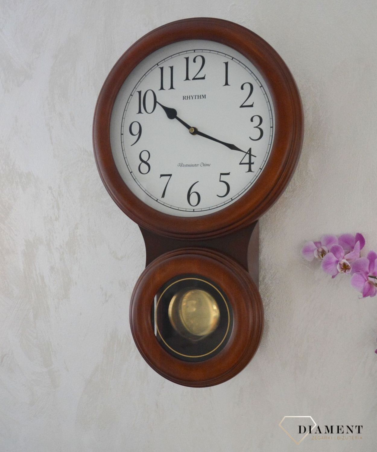 Zegar ścienny Rhythm drewniany z wahadłem CMJ575NR06ybnfgy.jpg