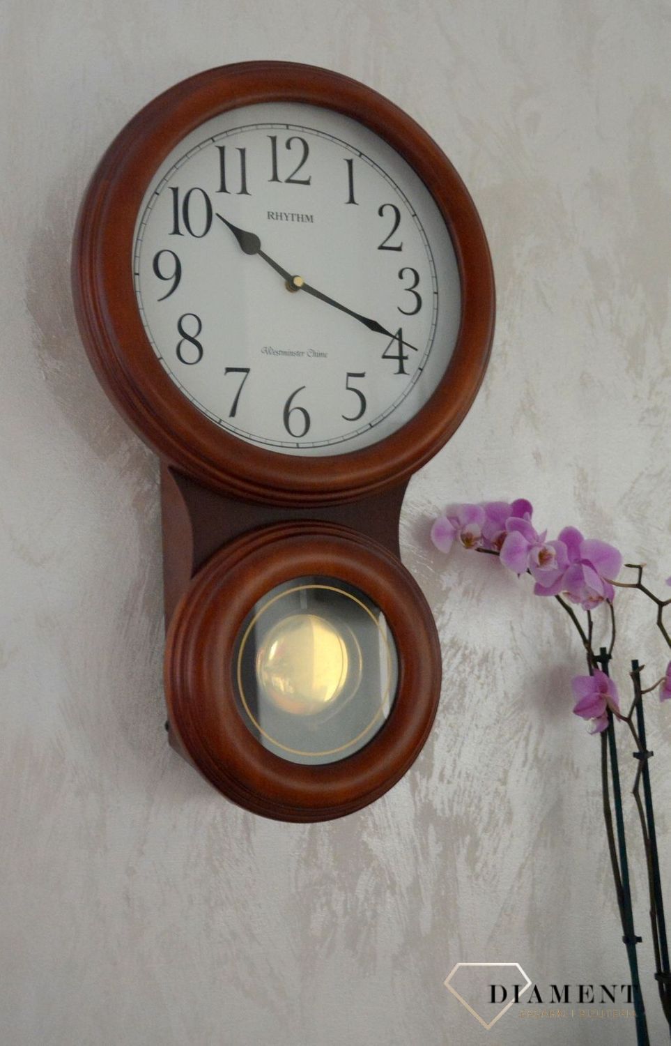 Zegar ścienny Rhythm drewniany z wahadłem CMJ575NR06ybnfgy.jpg