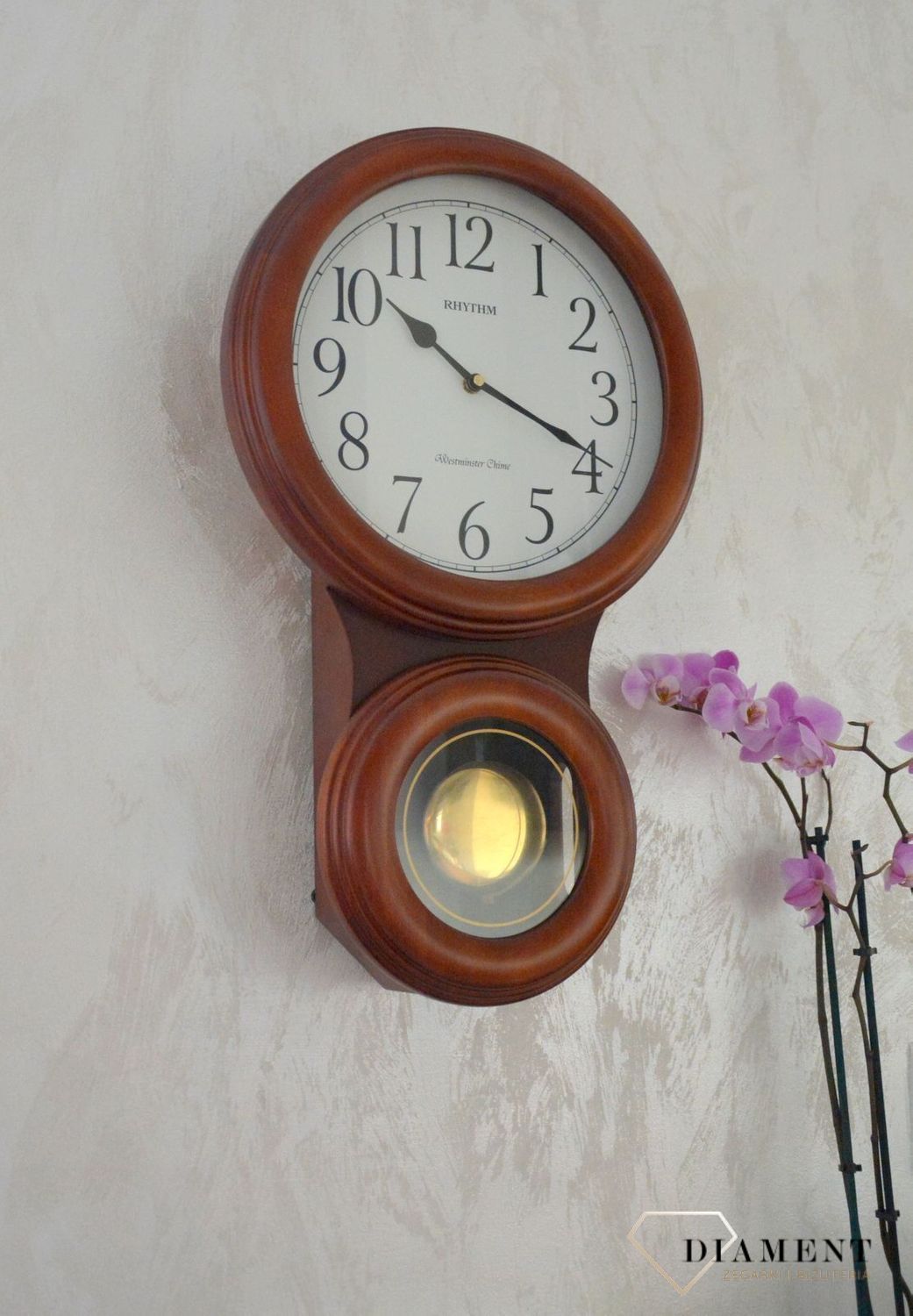 Zegar ścienny Rhythm drewniany z wahadłem CMJ575NR06ybnfgy.jpg