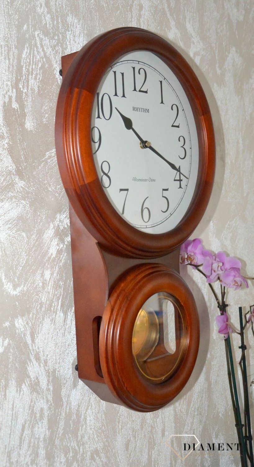 Zegar ścienny Rhythm drewniany z wahadłem CMJ575NR06ybnfgy.jpg