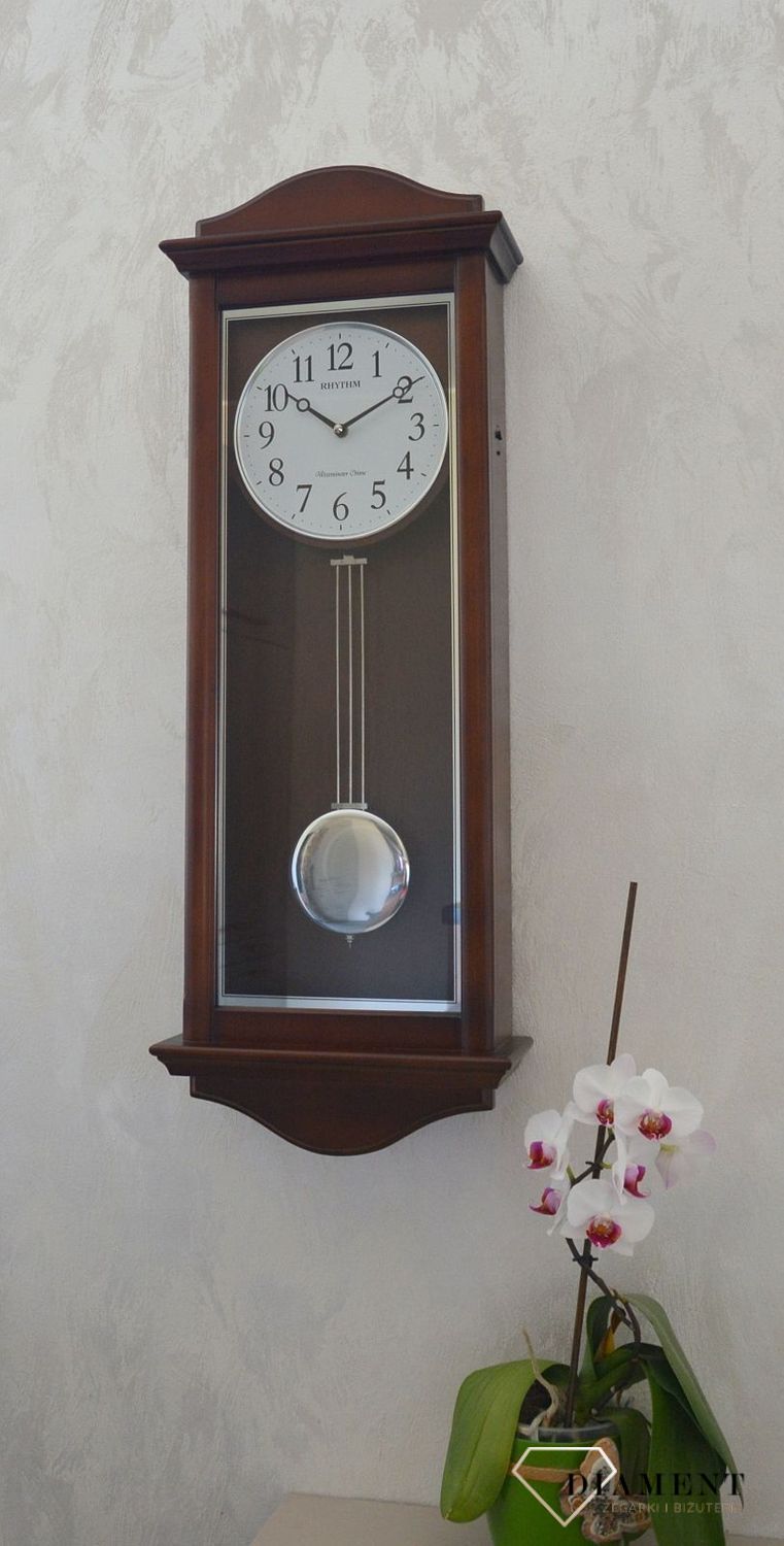 Zegar ścienny drewniany z wahadłem Rhythm CMJ590NR06.jpg