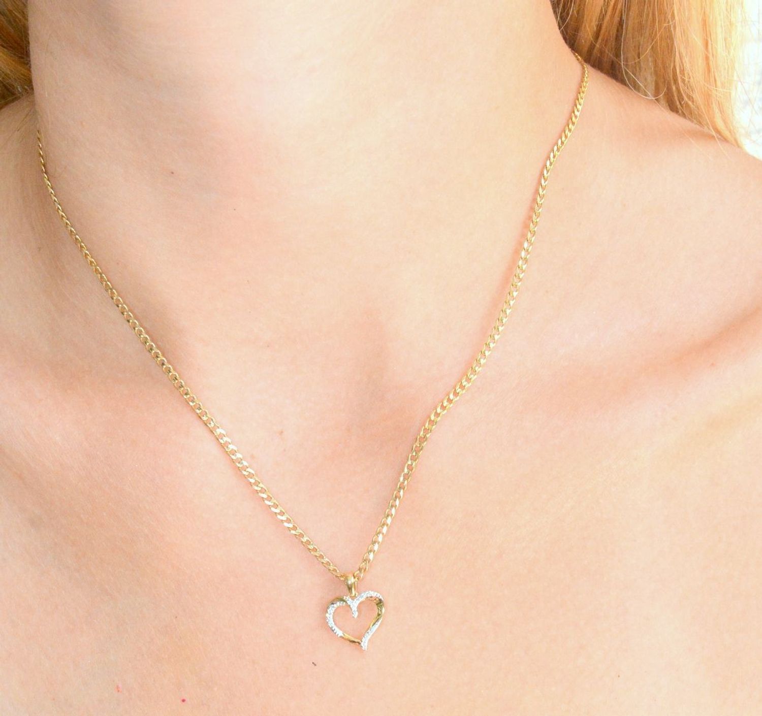 Zawieszka złota Kontur serduszka z 19 Diamentami 585 CP4740Y.jpg