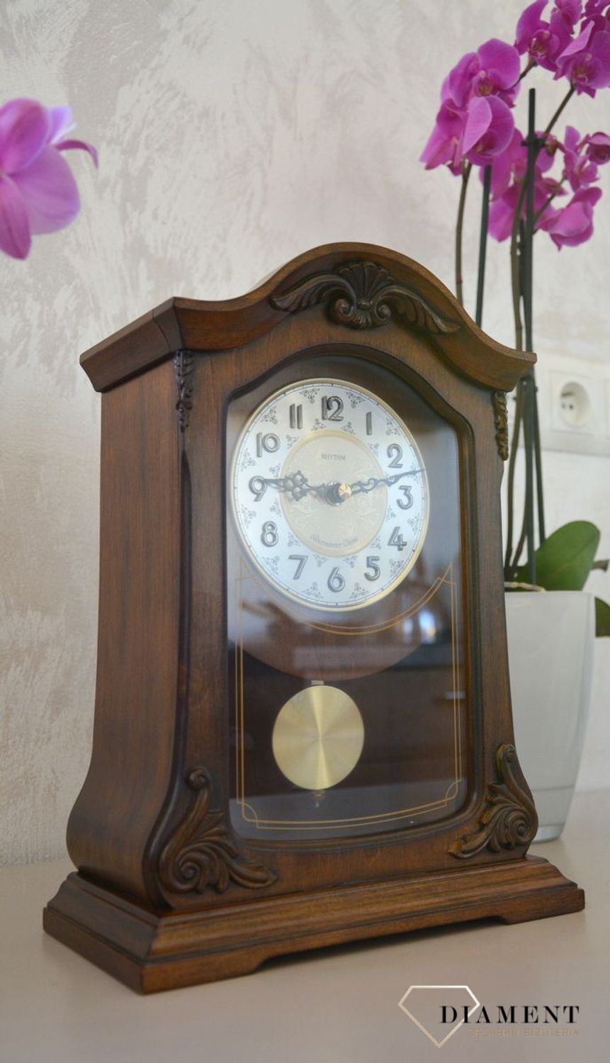 Zegar kominkowy Rhythm CRJ717CR06  Ciemny Orzech, melodyjny, kwarcowy.jpg