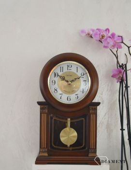 Zegar kominkowy drewniany z wahadłem RHYTHM Orzech CRJ722CR06 🕰 Zegar kominkowy drewniany wykonany z wytrzymałego materiału w kolorze orzech (1).JPG