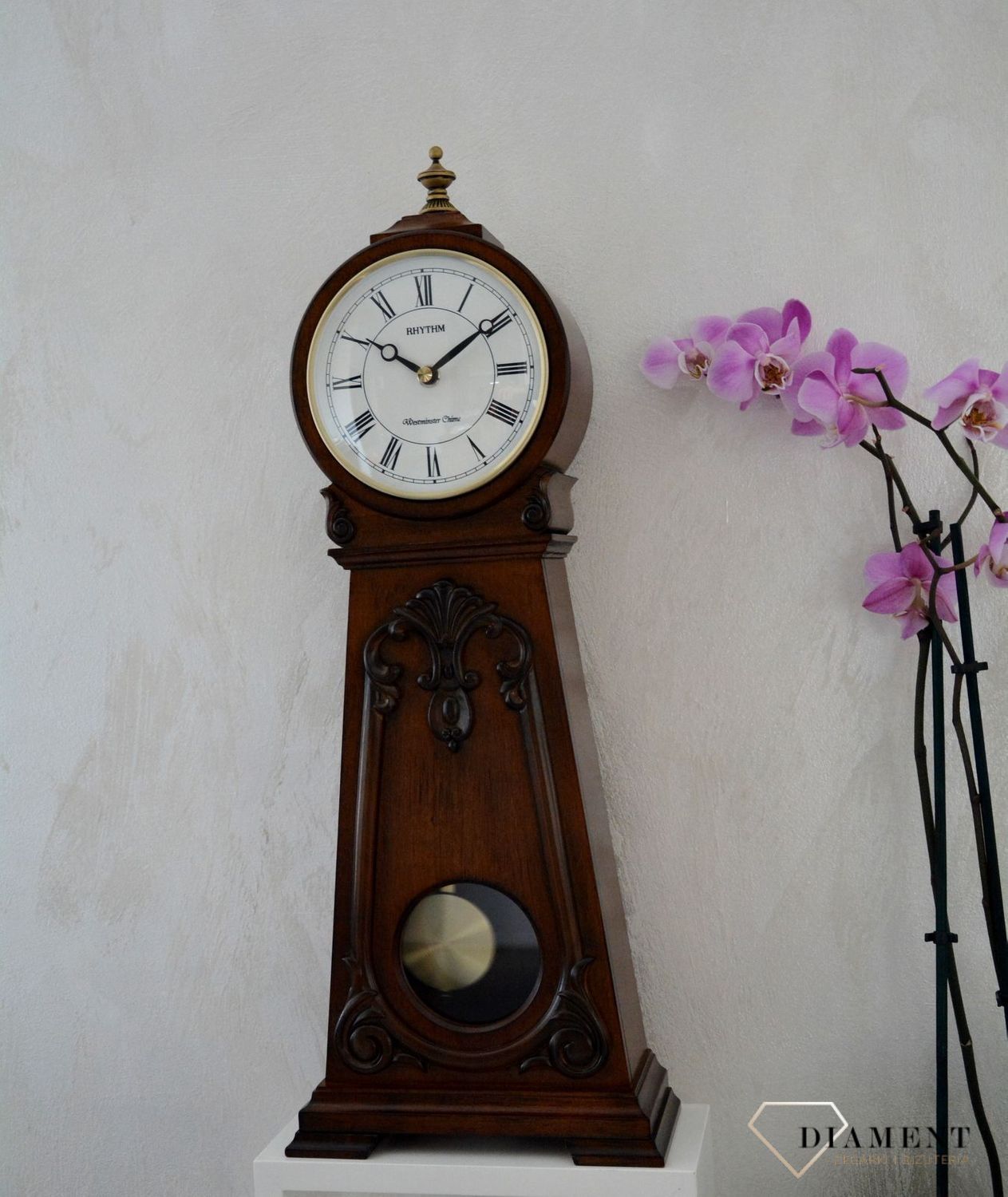 Efektowny zegar kominkowy drewniany RHYTHM Orzech CRJ749NR06.jpg
