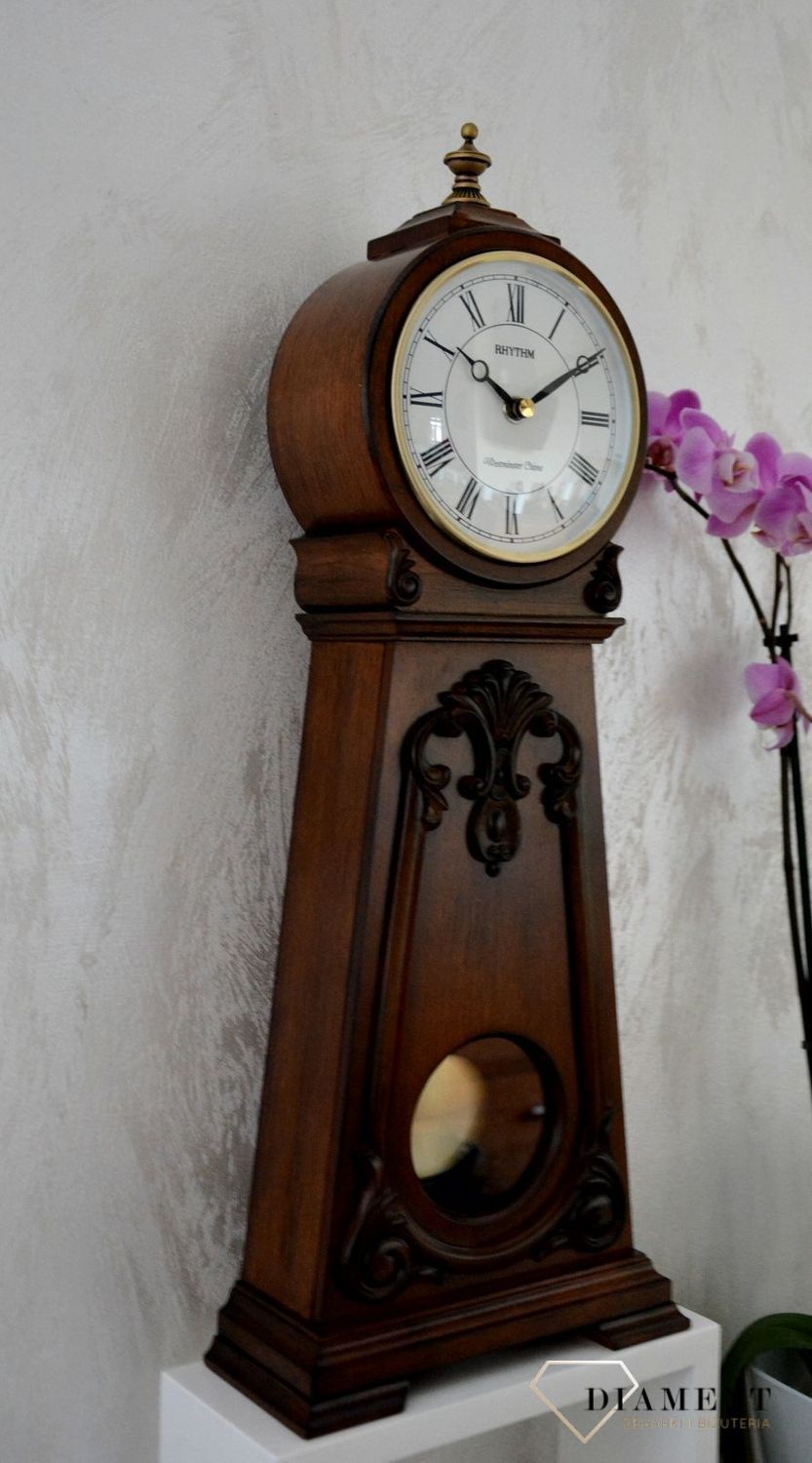 Efektowny zegar kominkowy drewniany RHYTHM Orzech CRJ749NR06.jpg