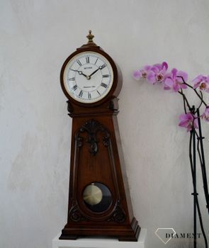 Efektowny zegar kominkowy drewniany RHYTHM Orzech CRJ749NR06 🕰  Zegar kominkowy wykonany z wytrzymałego materiału jakim jest drewno w barwie orzecha (3).JPG