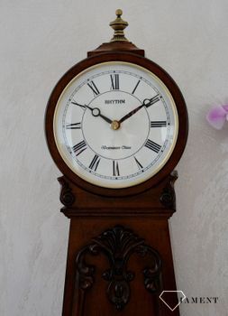 Efektowny zegar kominkowy drewniany RHYTHM Orzech CRJ749NR06 🕰  Zegar kominkowy wykonany z wytrzymałego materiału jakim jest drewno w barwie orzecha (6).JPG