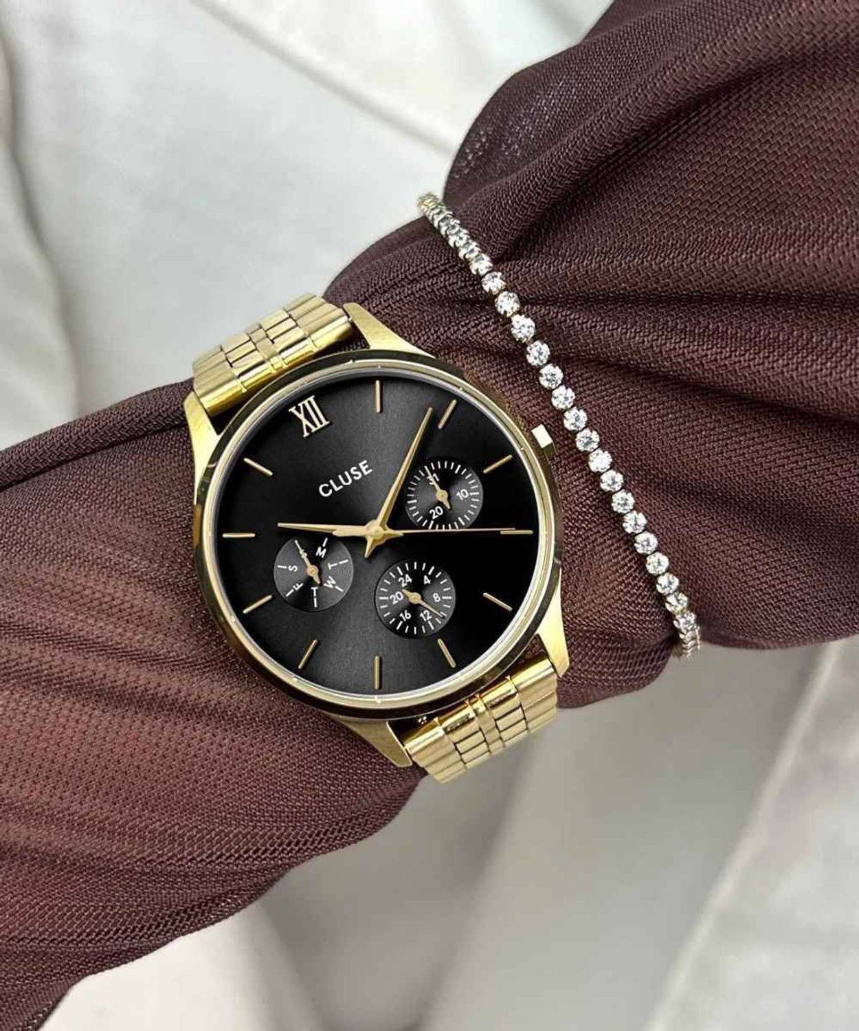Zegarek damski Cluse Minuit Multifunction CW10707 Gold Black Dial 34 mm.jpg