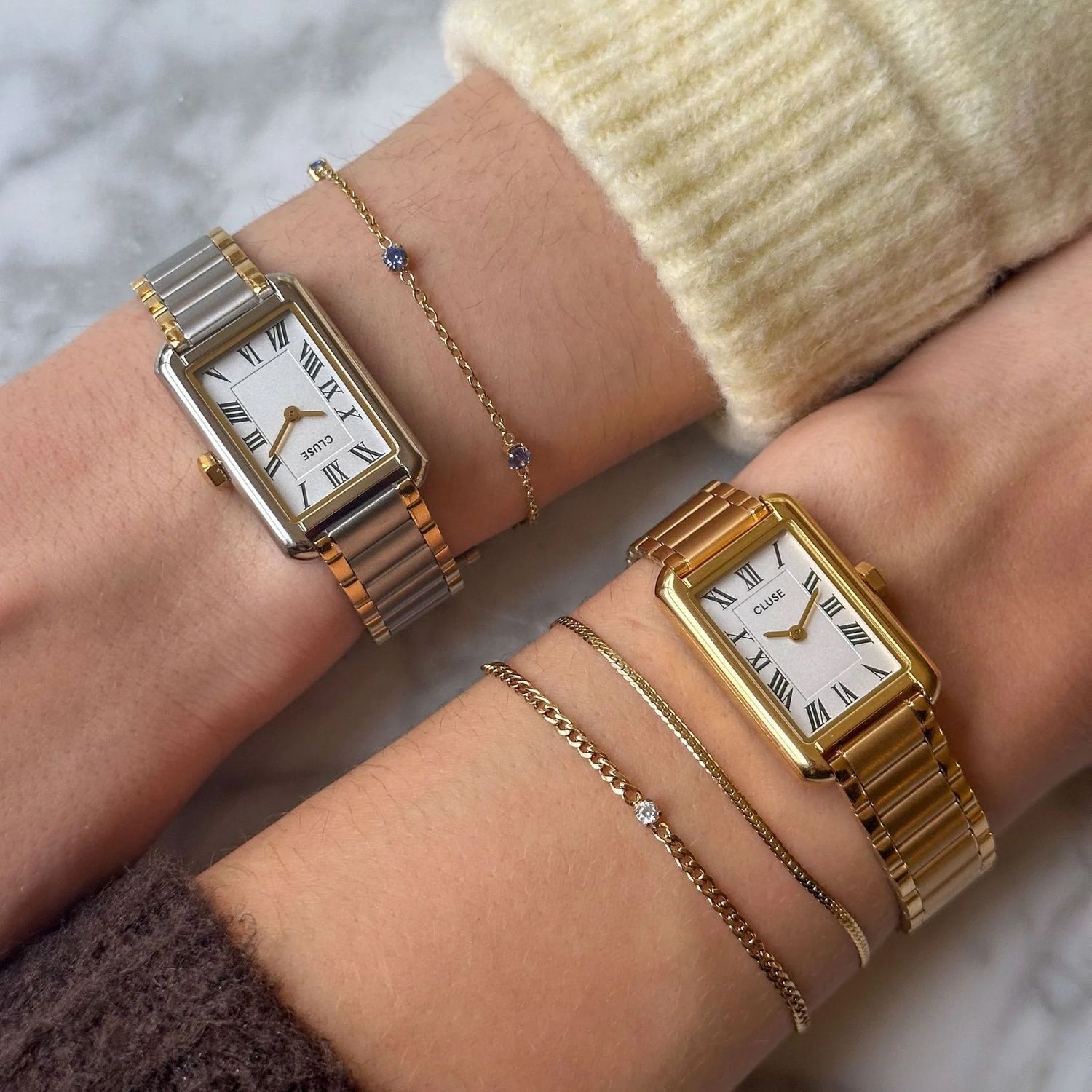 Elegancki zegarek damski Cluse CW15001 Belisenna z kopertą ze stali szlachetnej w złotym odcieniu, białą tarczą, mechanizmem kwarcowym i wodoszczelnością 5 ATM. Bransoleta G-Link z możliwością regulacji długości.1.jpg