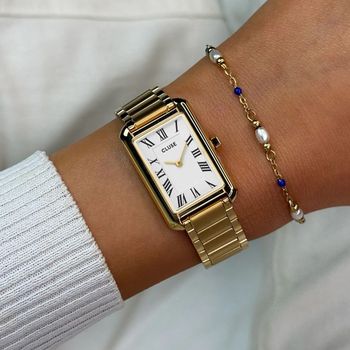 Elegancki zegarek damski Cluse CW15001 Belisenna z kopertą ze stali szlachetnej w złotym odcieniu, białą tarczą, mechanizmem kwarcowym i wodoszczelnością 5 ATM. Bransoleta G-Link z możliwością regulacji długości.2.jpg