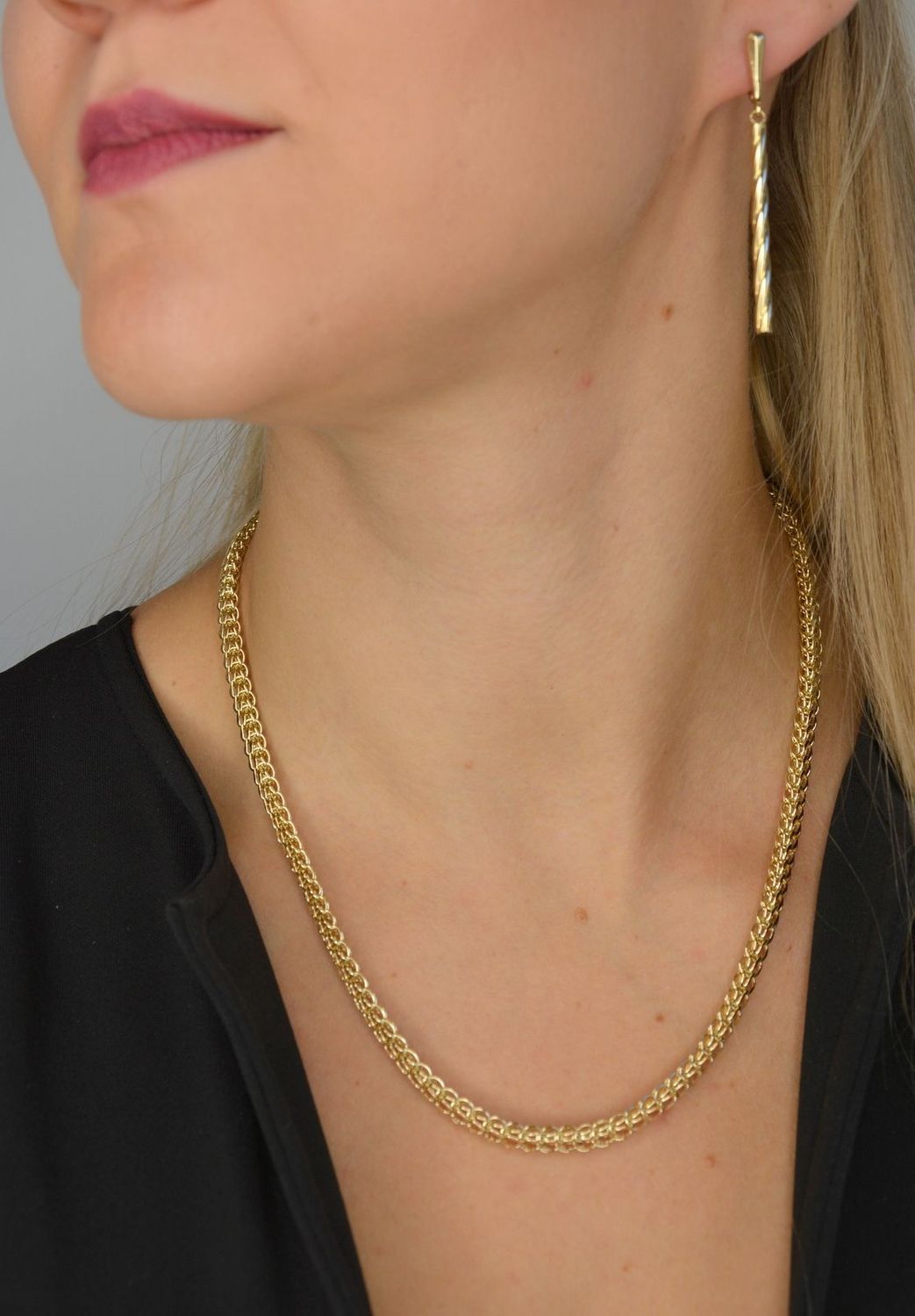 Złote długie kolczyki wiszące 585 o kształcie świderka DBK000000-024.jpg