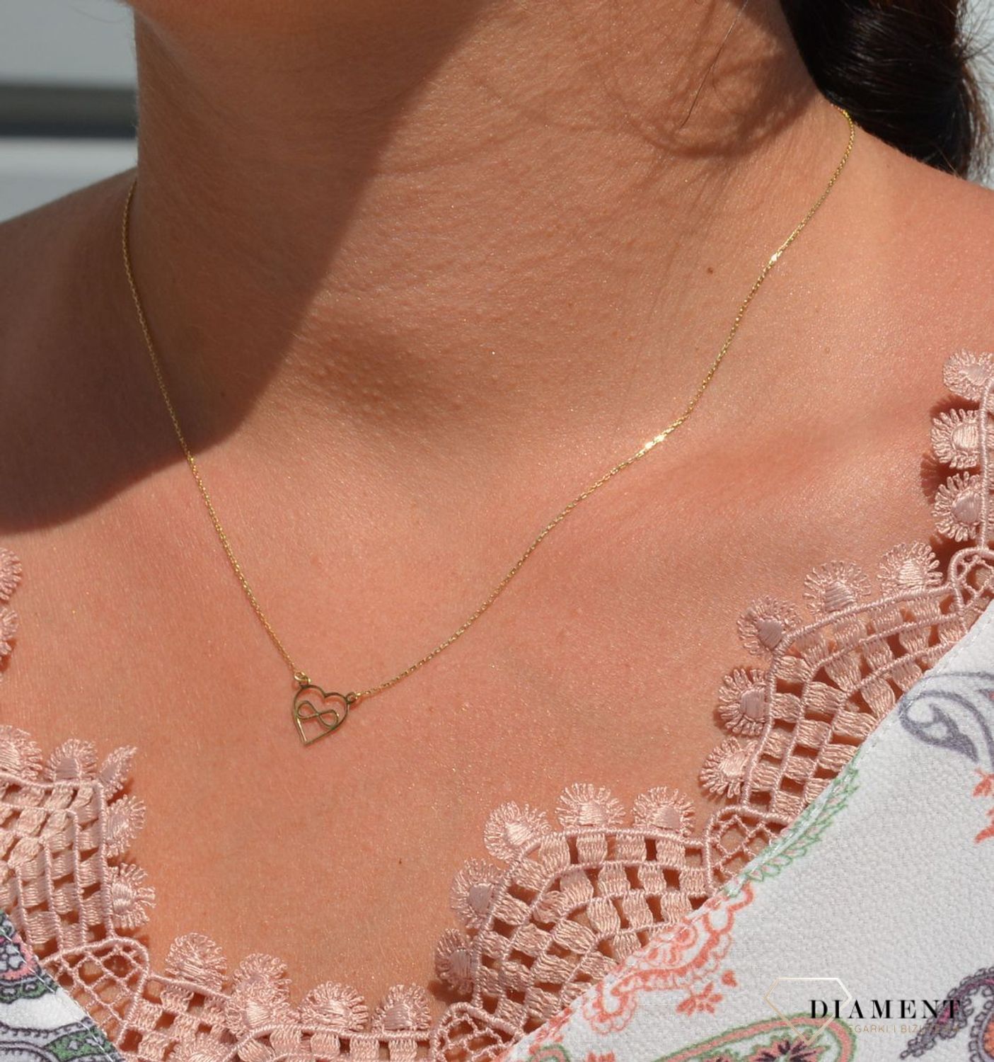 Złoty naszyjnik celebrytka 585 'znak nieskończoności w sercu'.jpg