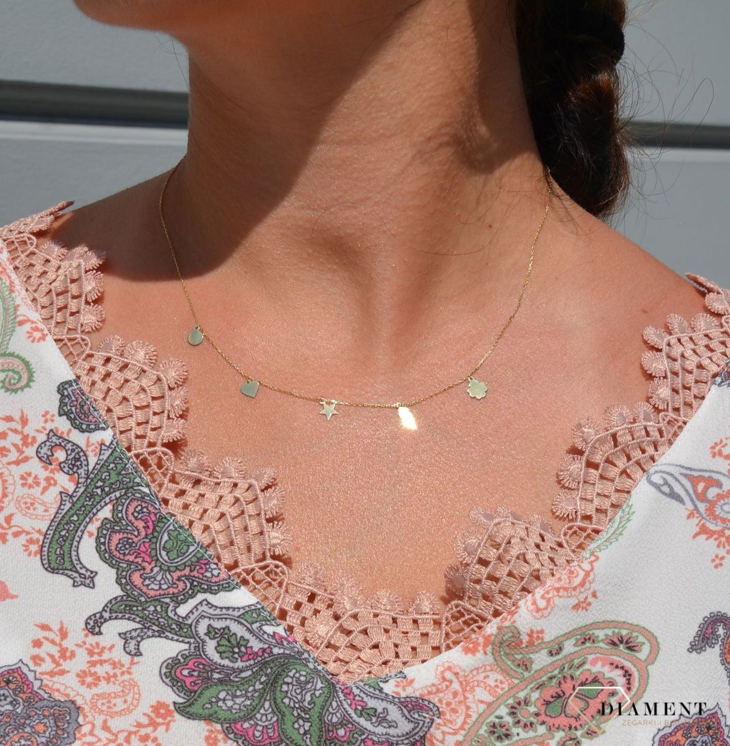 Złoty naszyjnik celebrytka 585 'koniczynka, piórko, gwiazdka, serce, kółko'.jpg