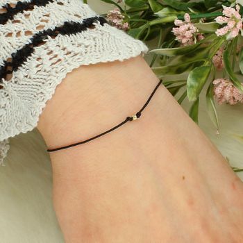 Bransoletka szczęścia złota 585 na sznurku – mini kuleczka, regulowana Au.jpg