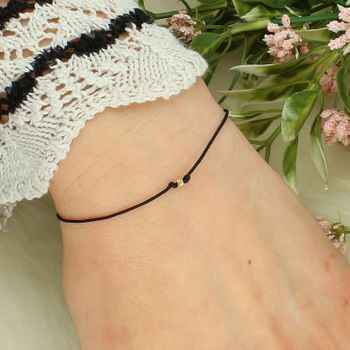 Bransoletka szczęścia złota 585 na sznurku – mini kuleczka, regulowana.jpg