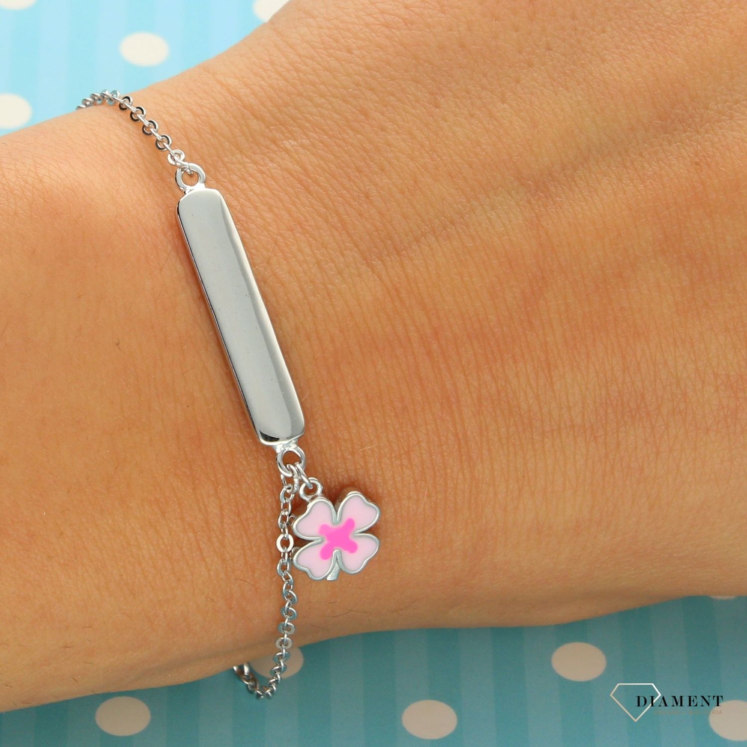 Bransoletka srebrna dla dziecka z blaszką i kwiatkiem.jpg