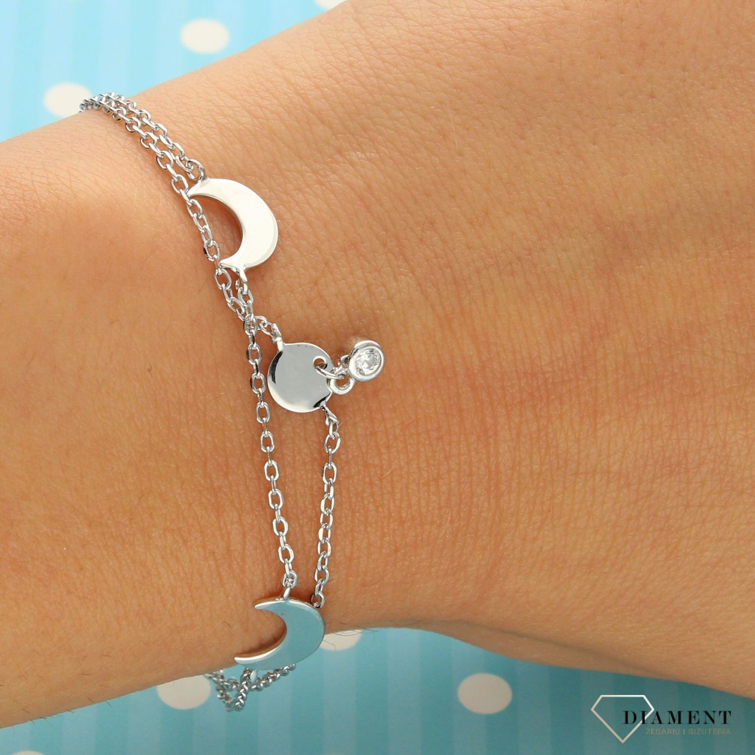 Srebrna bransoletka celebrytka 925 księżyc z cyrkonią DIA-BRA-0681-925. Wyjątkowa odsłona srebrnej bransoletki obfituje w minimalistyczne formy (2).jpg