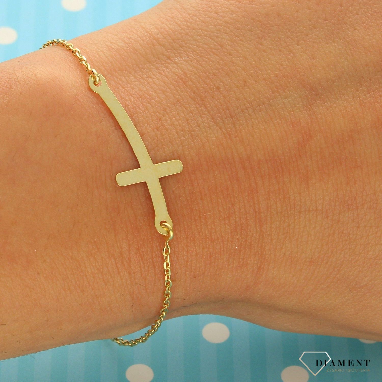 Pozłacana bransoletka srebrna 925 z krzyżykiem DIA-BRA-0682-925 ✅ Pozłacana bransoletka srebrna wykonana z wysokiej jakości srebra próby 925  (1).jpg