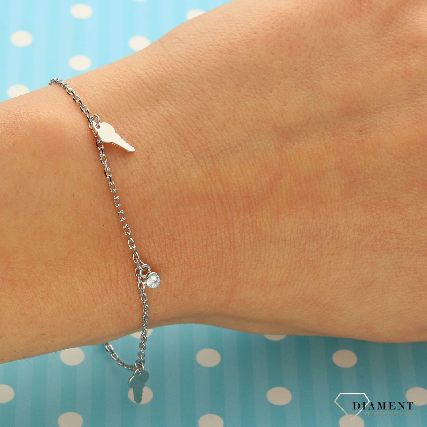 Srebrna bransoletka damska 925 'wiszące kluczyki' DIA-BRA-0694-925 ✅ Srebrna bransoletka wykonana z wysokiej jakości srebra próby 925 (1).jpg