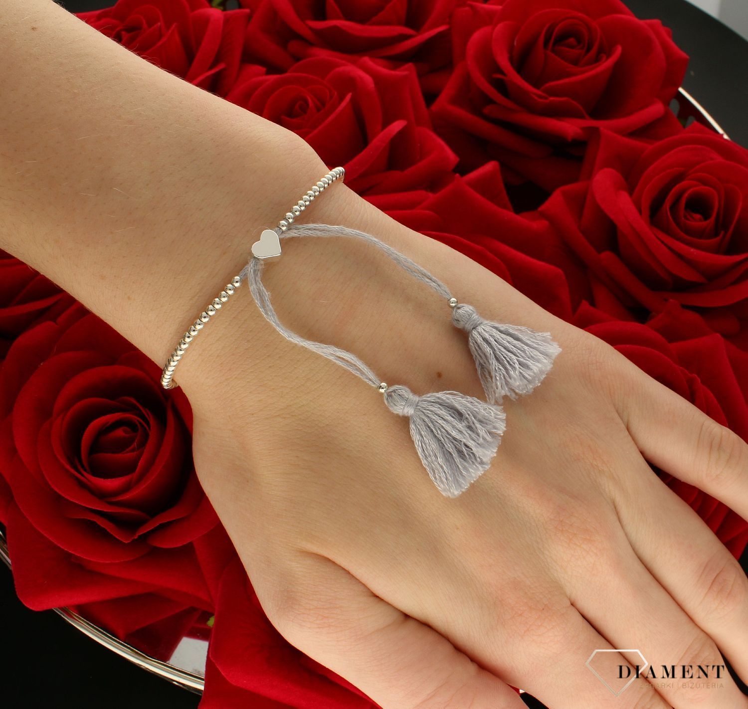 Bransoletka na ozdobnym sznurku z kuleczkami i serduszkiem BRASICI000501700.jpg