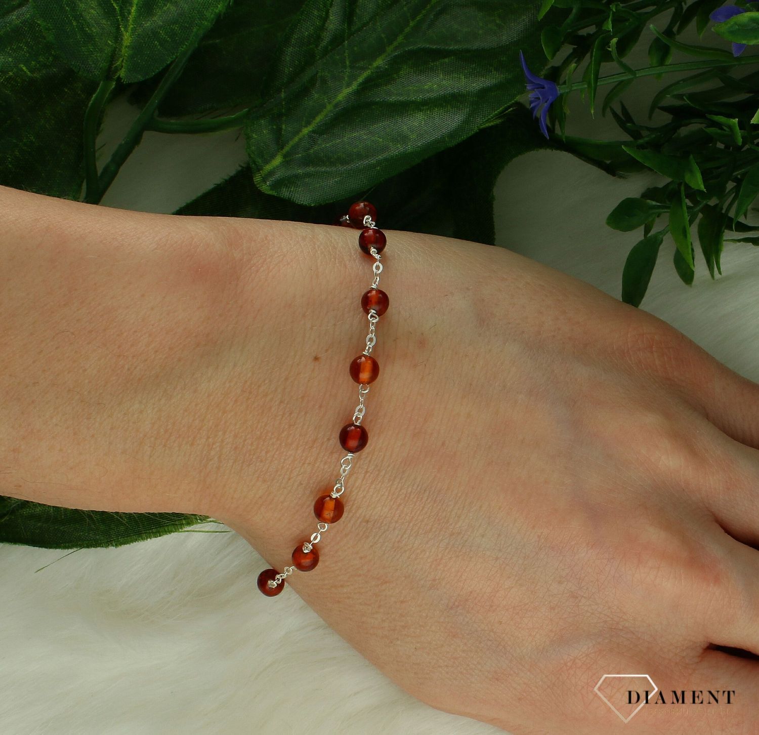 Srebrna bransoletka damska 925 z koniakowym bursztynem różaniec DIA-BRA-10434-925-925. Srebrna bransoletka damska. Srebrna bransoletka z bursztynem. Bransoletka damska z bursztynem różaniec (1).jpg