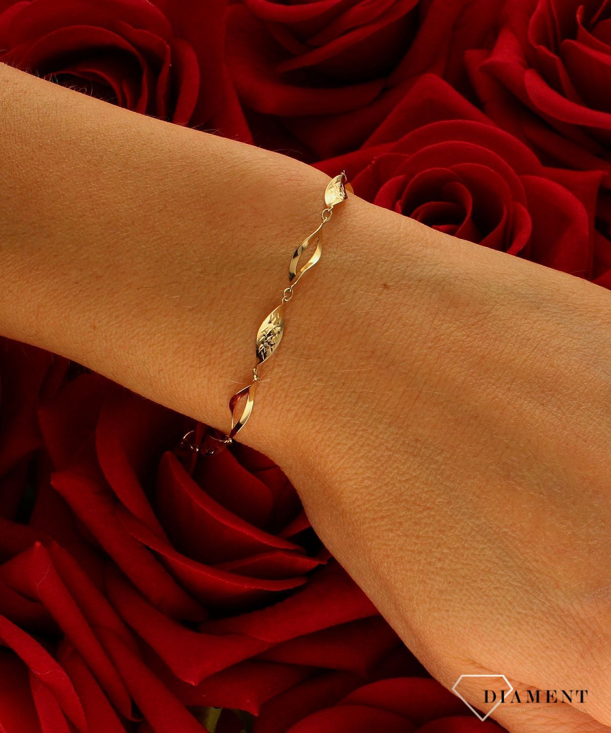 Złota bransoletka damska o formie skręconych, wygrawerowanych sopelków 585 DIA-BRA-10472-585 (2).jpg