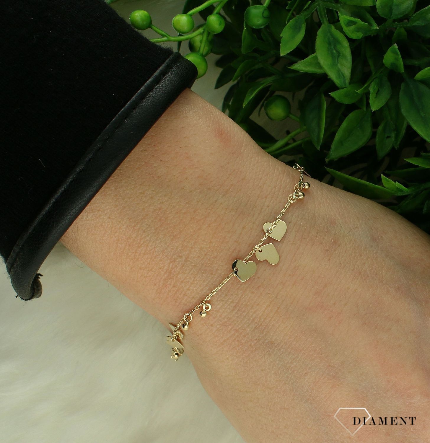 Bransoletka damska złota 585 Wiszące serca i kulki.jpg