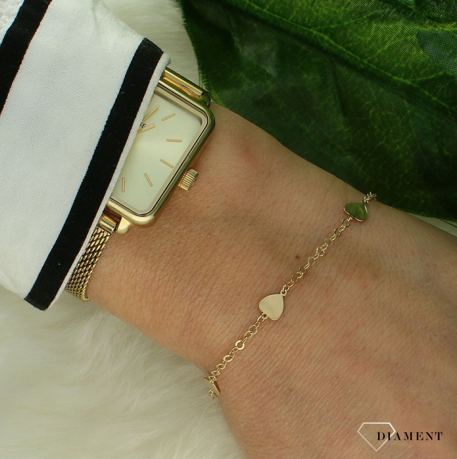 Bransoleta złota z serduszkami DIA-BRA-11250-375 (1).jpg