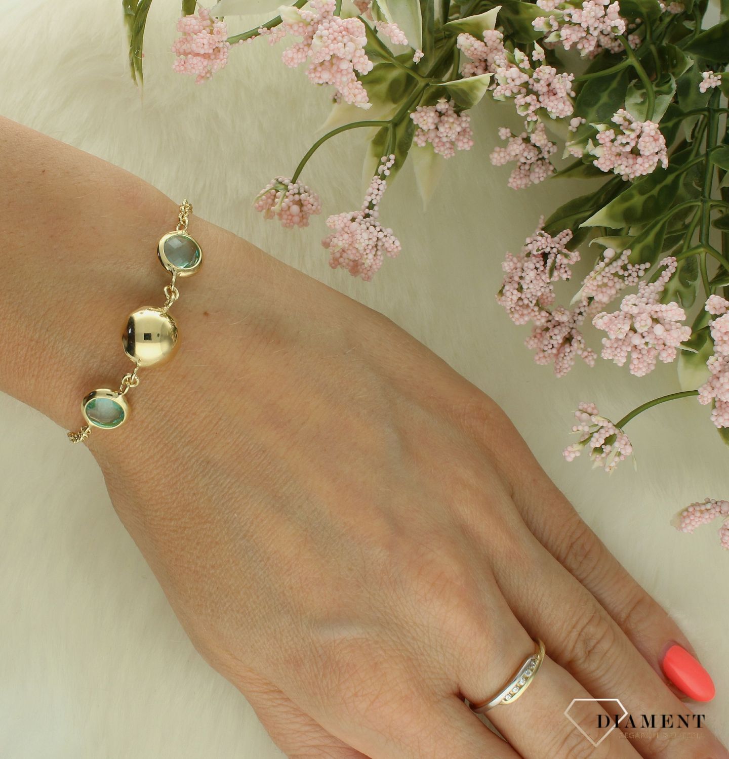 Srebrna bransoletka damska kule z zieloną cyrkonią DIA-BRA-11693-925.jpg