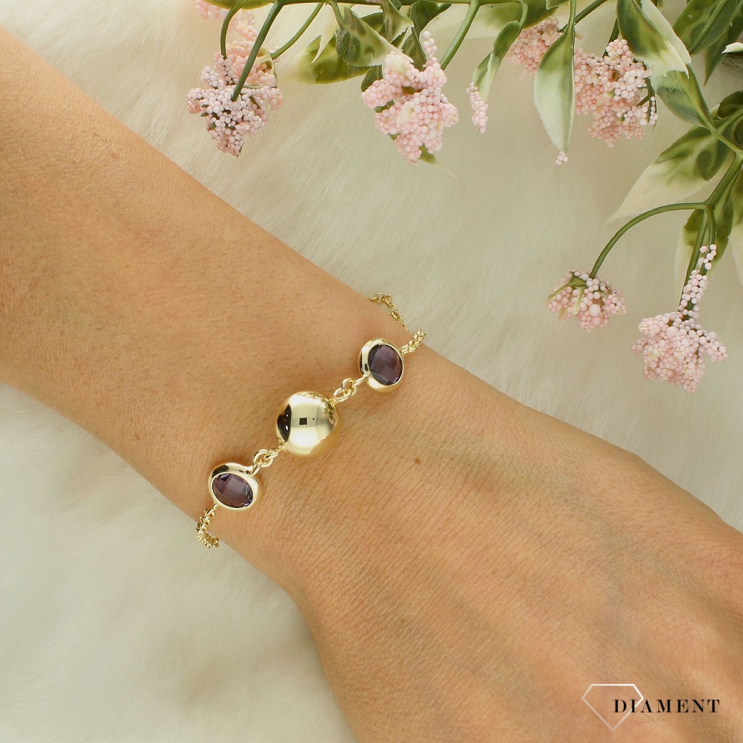 Srebrna bransoletka damska pokryta złotem kule z fioletową cyrkonią DIA-BRA-11698-925 (1).jpg