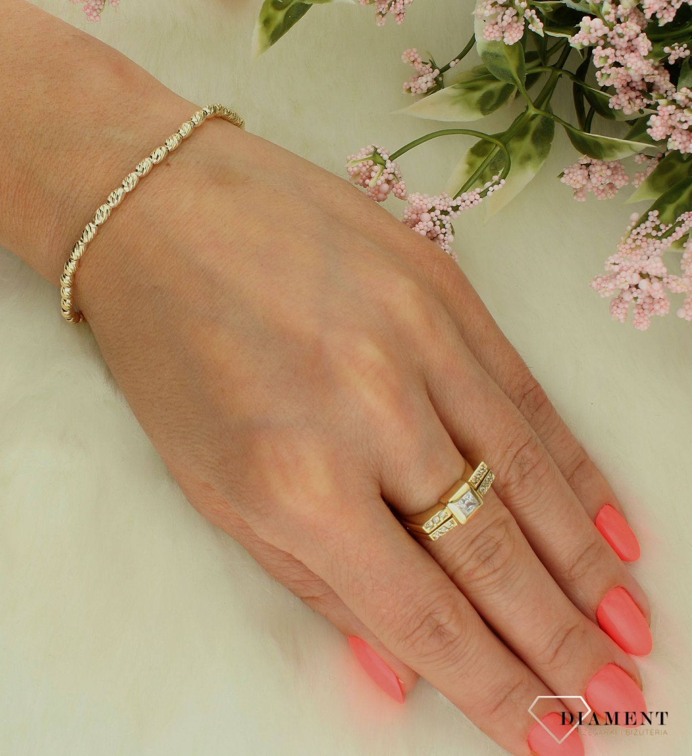 Srebrna bransoletka damska 925 pokryta złotem o ozdobnym splocie z kuleczek DIA-BRA-11753-925 (1).jpg