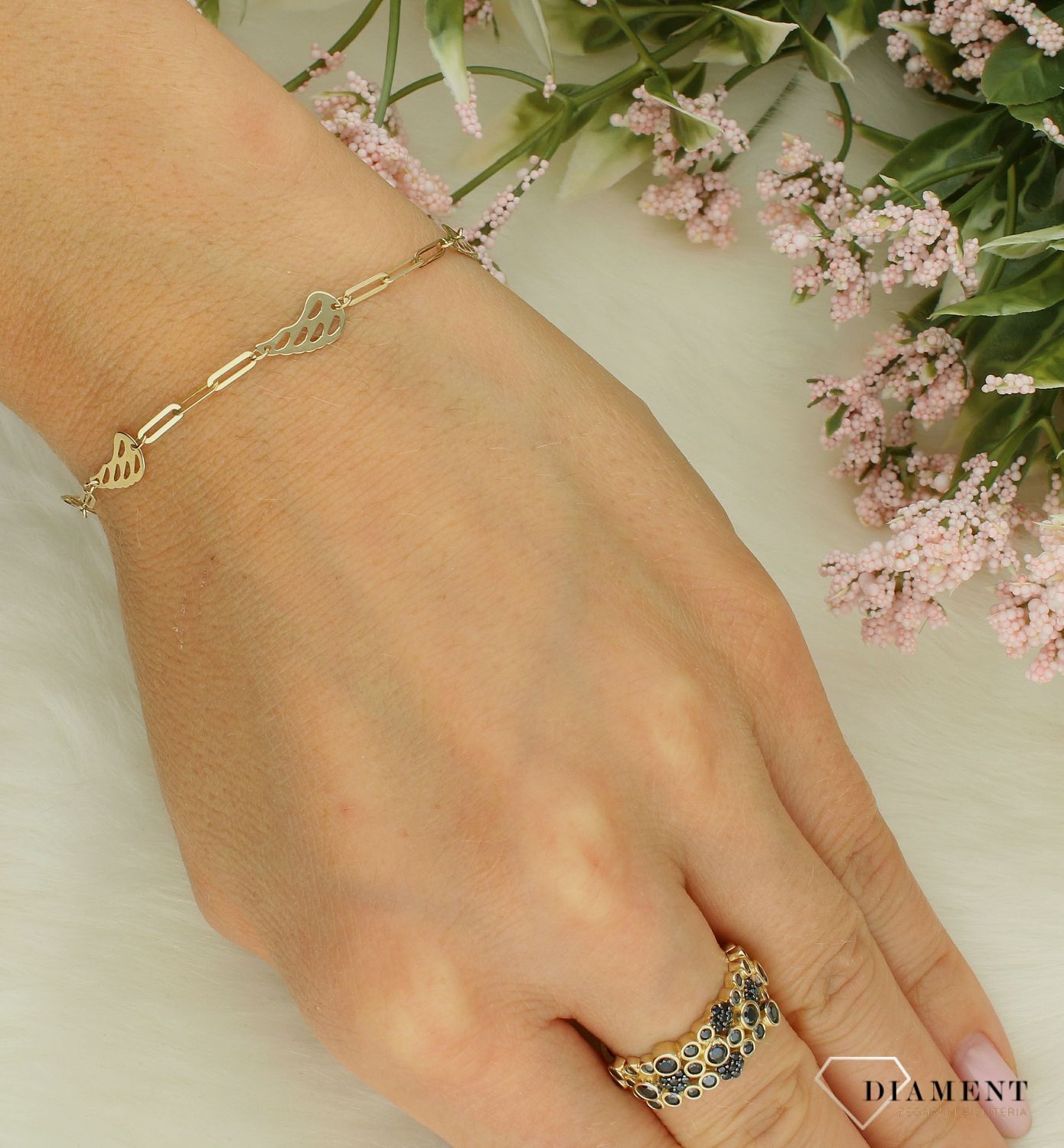 Złota bransoletka damska 585 ze skrzydełkami i cyrkonią DIA-BRA-11983-585. Złota bransoletka damska. Złota bransoletka próby 585. Bransoletka damska ze złota. Bransoletka złota na prezent (2).jpg