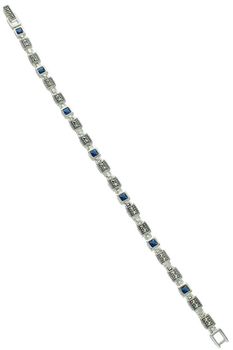 Elegancka bransoletka damska srebrna próba 925 z kwadratowymi ogniwkami zdobionymi markazytami i syntetycznymi szafirami. Długość 18 cm, szerokość 5 mm, zapięcie na zatrzask.1.jpg
