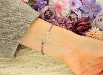 Delikatna bransoletka damska srebro 925 DIA-BRA-13108-925 z ametystem 2 mm. Regulowana długość 18–20 cm, waga 1,40 g. Subtelna i elegancka biżuteria na każdą okazję.3.jpg