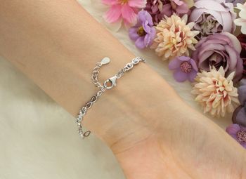 Odkryj srebrną bransoletkę 925 z motywem nieskończoności i cyrkoniami. Model DIA-BRA-13349-925 – elegancja, symbolika i styl w jednym. Idealna na prezent!3.jpg