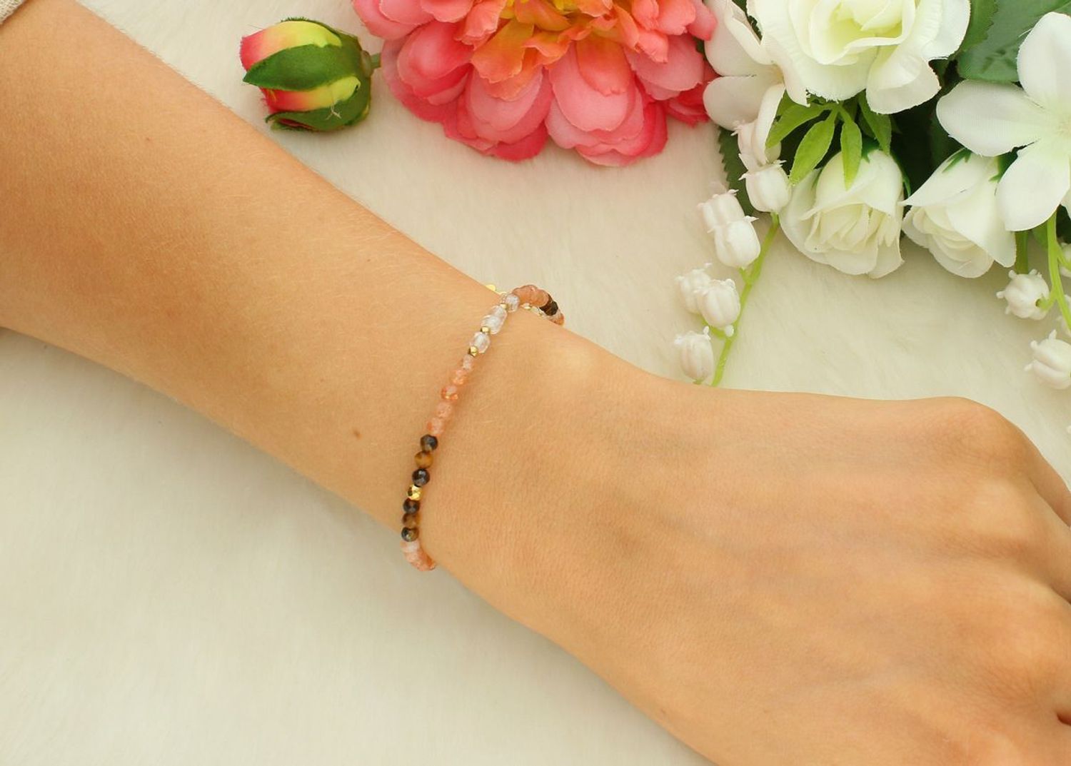 Bransoletka damska ze srebra próby 925 z kamieniami naturalnymi kamień słoneczny i tygrysie oko. Długość 17+2 cm, waga 2,50 g, zapięcie na karabińczyk. 1.jpg