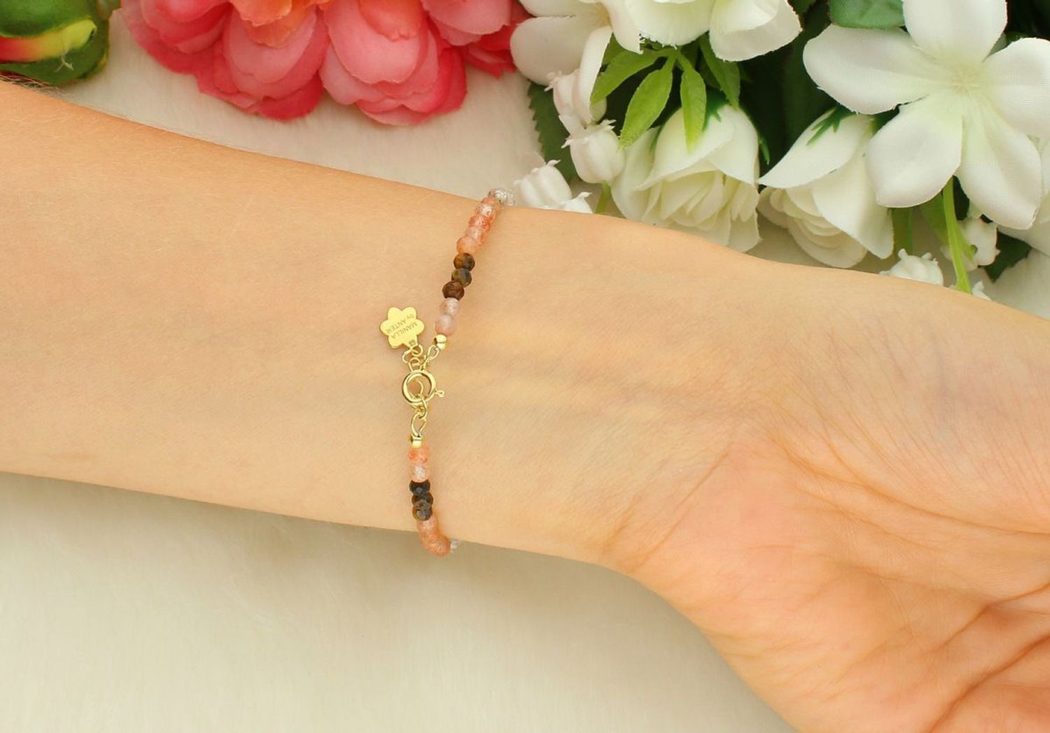 Bransoletka damska ze srebra próby 925 z kamieniami naturalnymi kamień słoneczny i tygrysie oko. Długość 17+2 cm, waga 2,50 g, zapięcie na karabińczyk. 1.jpg