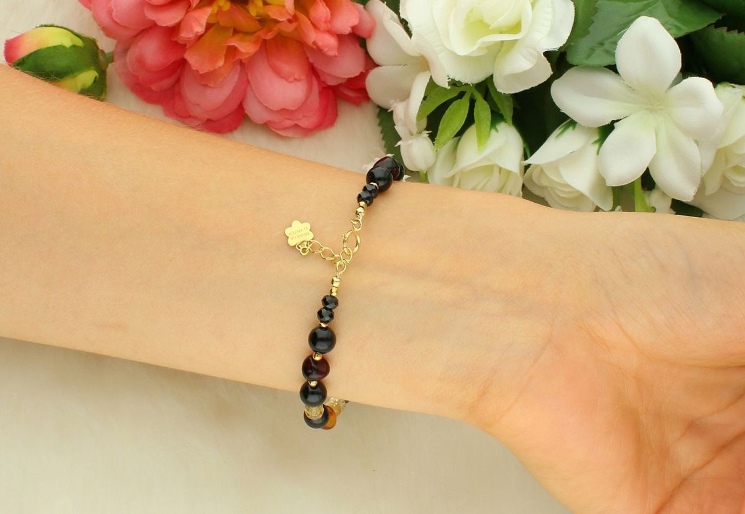 Elegancka bransoletka damska ze srebra próby 925 z naturalnymi kamieniami bursztyn, turmalin, cytryn i spinel. Długość 18 cm + 2 cm regulacji, zapięcie na karabińczyk, waga 5,80 g.1.jpg