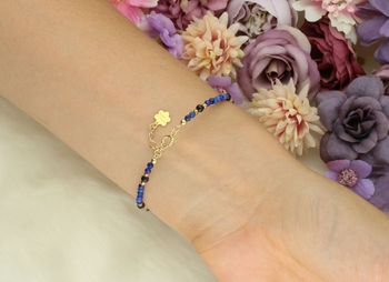 Pozłacana bransoletka damska DIA-BRA-13544-925 ze srebra próby 925, zdobiona kamieniami naturalnymi lapis, noc Kairu, kryształ górski. Długość 17+3 cm, waga 2,30 g. Delikatna i elegancka.3.jpg