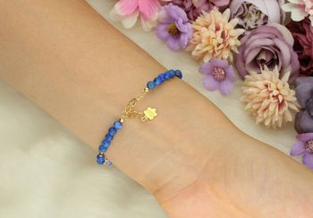 Bransoletka DIA-BRA-13558-925 ze srebra pozłacanego próby 925. Zdobiona kamieniami naturalnymi diamentem herkimer i lapis lazuli. Długość 17+2 cm, waga 3,60 g. Subtelna, kobieca, elegancka.3.jpg