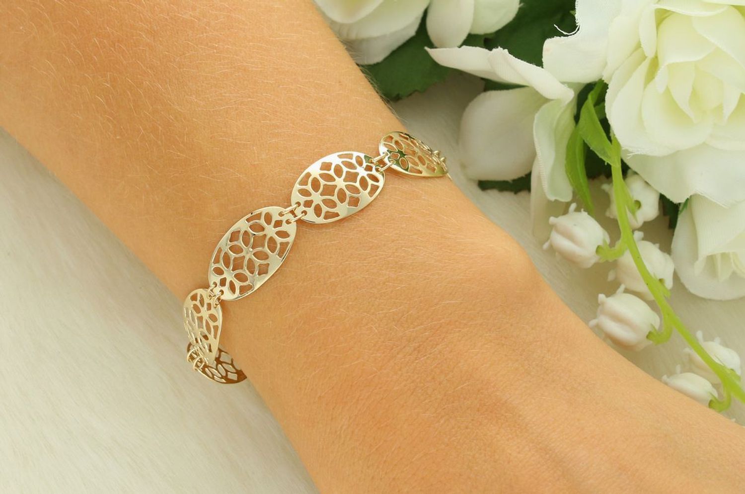 Elegancka bransoletka damska złota próby 585, model DIA-BRA-13679-585. Owalne ażurowe oczka, długość 17 cm (+3 cm), zapięcie na karabińczyk, szerokość 1,1 cm, waga 3,97 g. Idealna na prezent 1.jpg