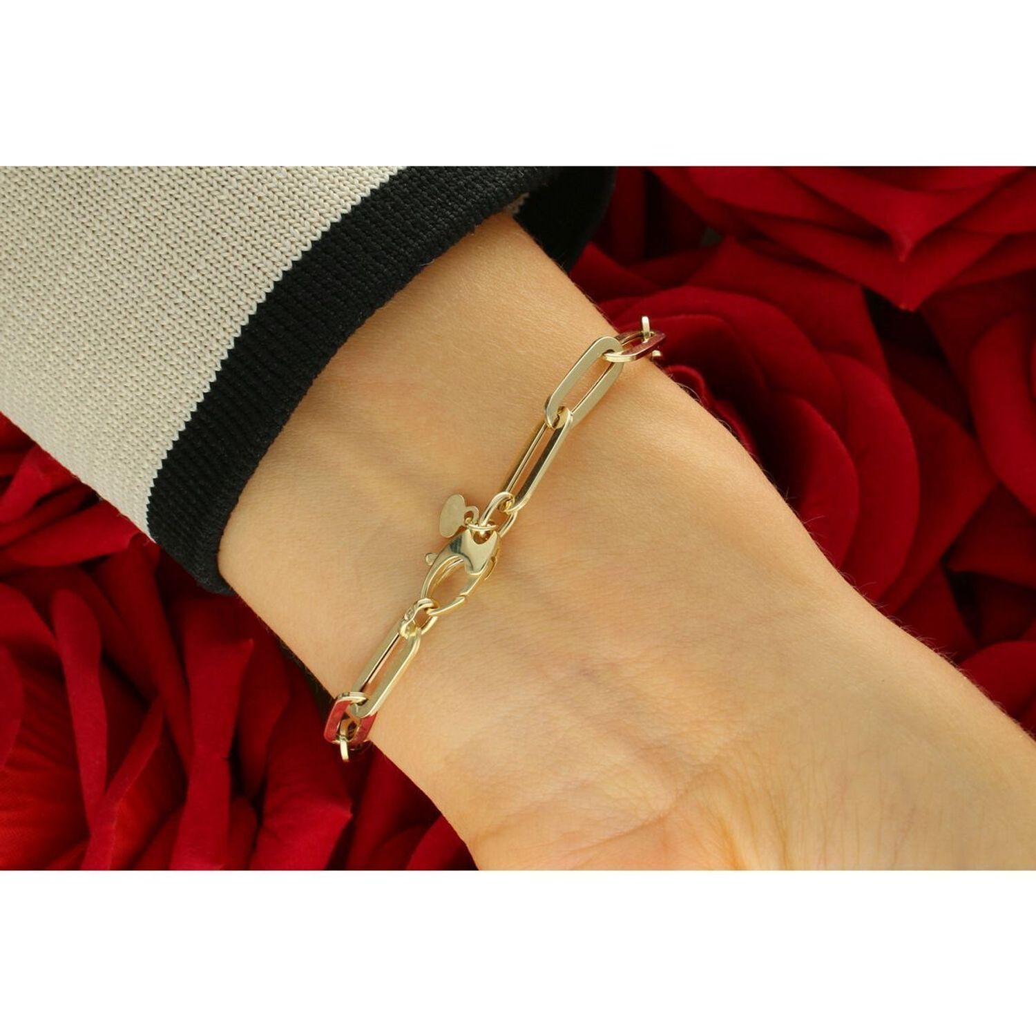 Elegancka złota bransoletka damska próby 585 w splocie spinaczowym. Długość 22 cm, szerokość 5 mm, waga 3,33 g, zapięcie na karabińczyk. Idealna do codziennych i eleganckich stylizacji.1.jpg