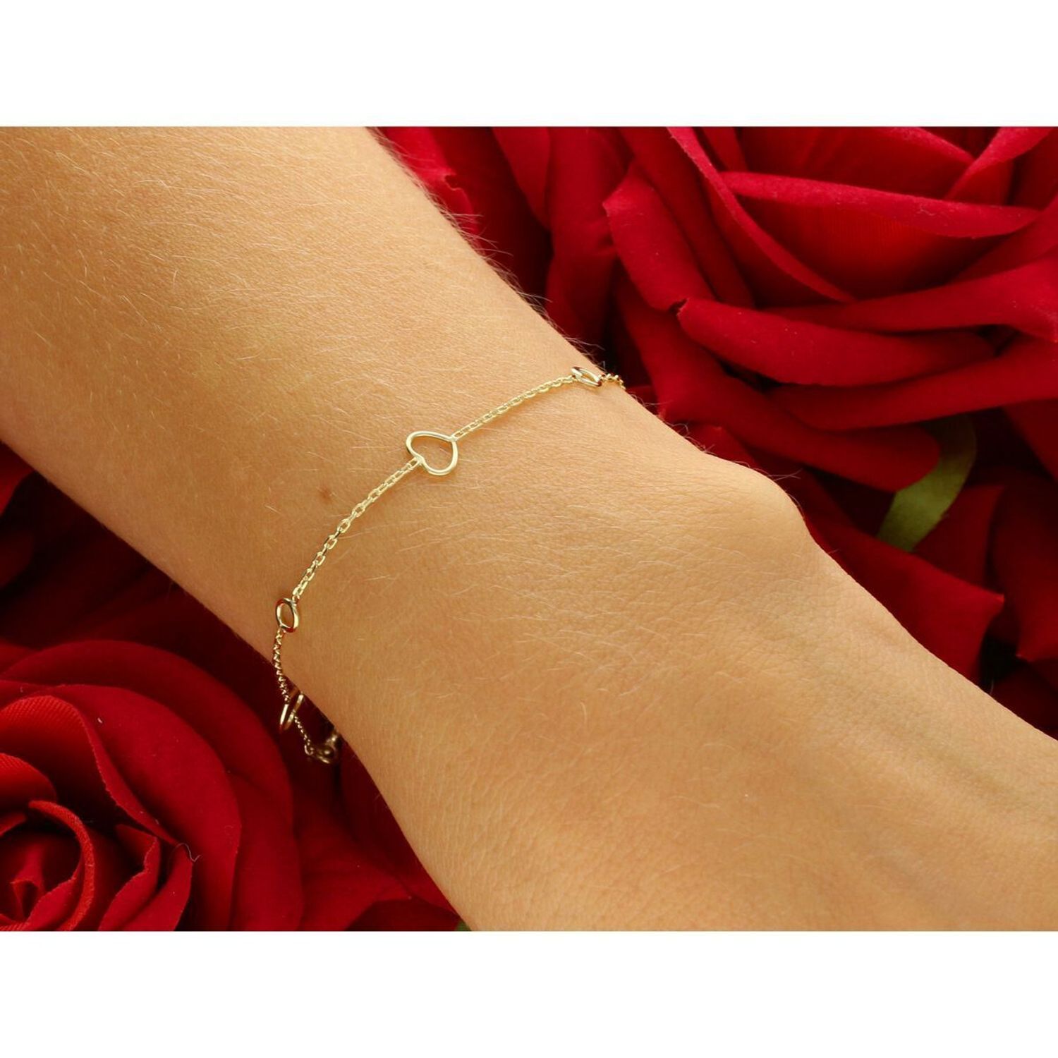 Subtelna złota bransoletka damska próby 585, zdobiona delikatnymi pustymi serduszkami i kółeczkami. Długość regulowana 17 cm + 2 cm, waga 0,97 g, zapięcie na karabińczyk.1.jpg