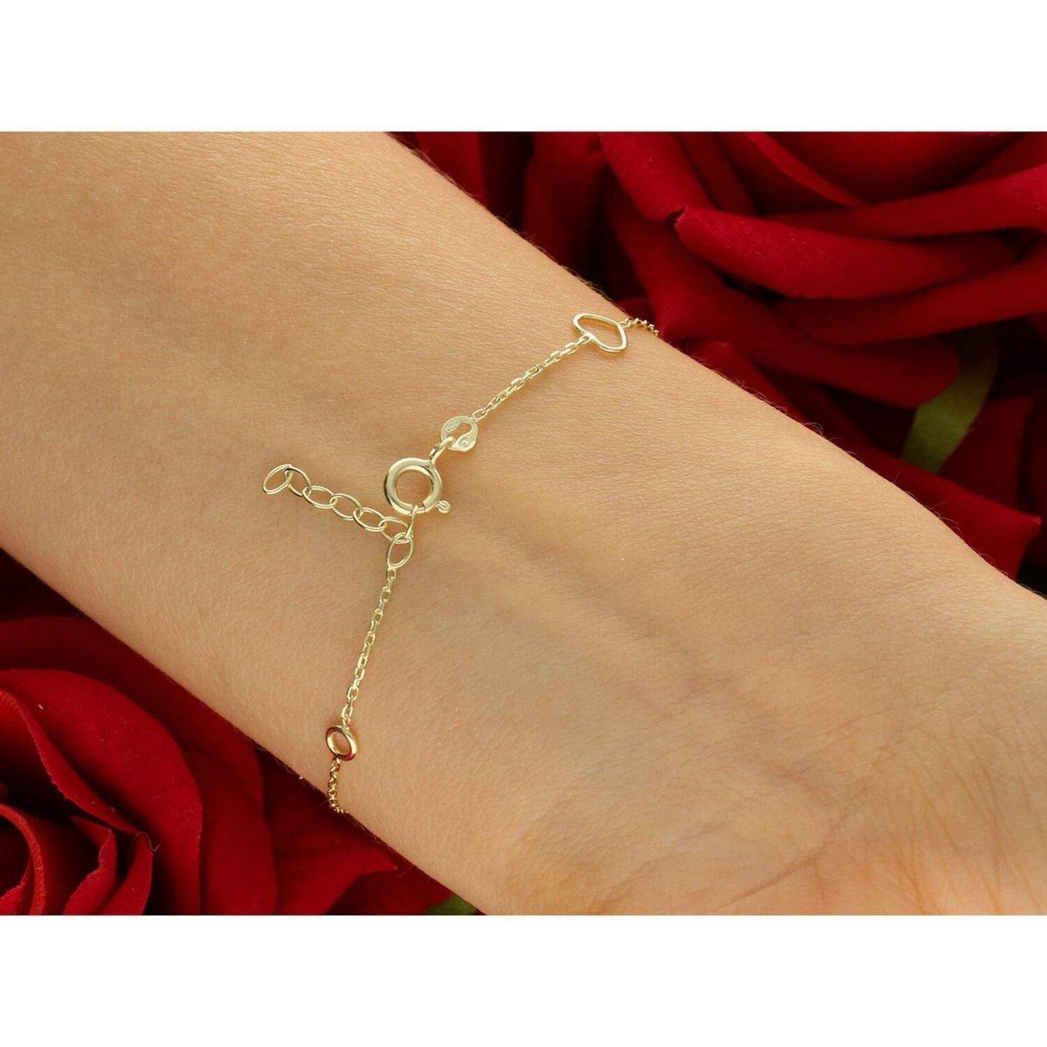 Subtelna złota bransoletka damska próby 585, zdobiona delikatnymi pustymi serduszkami i kółeczkami. Długość regulowana 17 cm + 2 cm, waga 0,97 g, zapięcie na karabińczyk.1.jpg