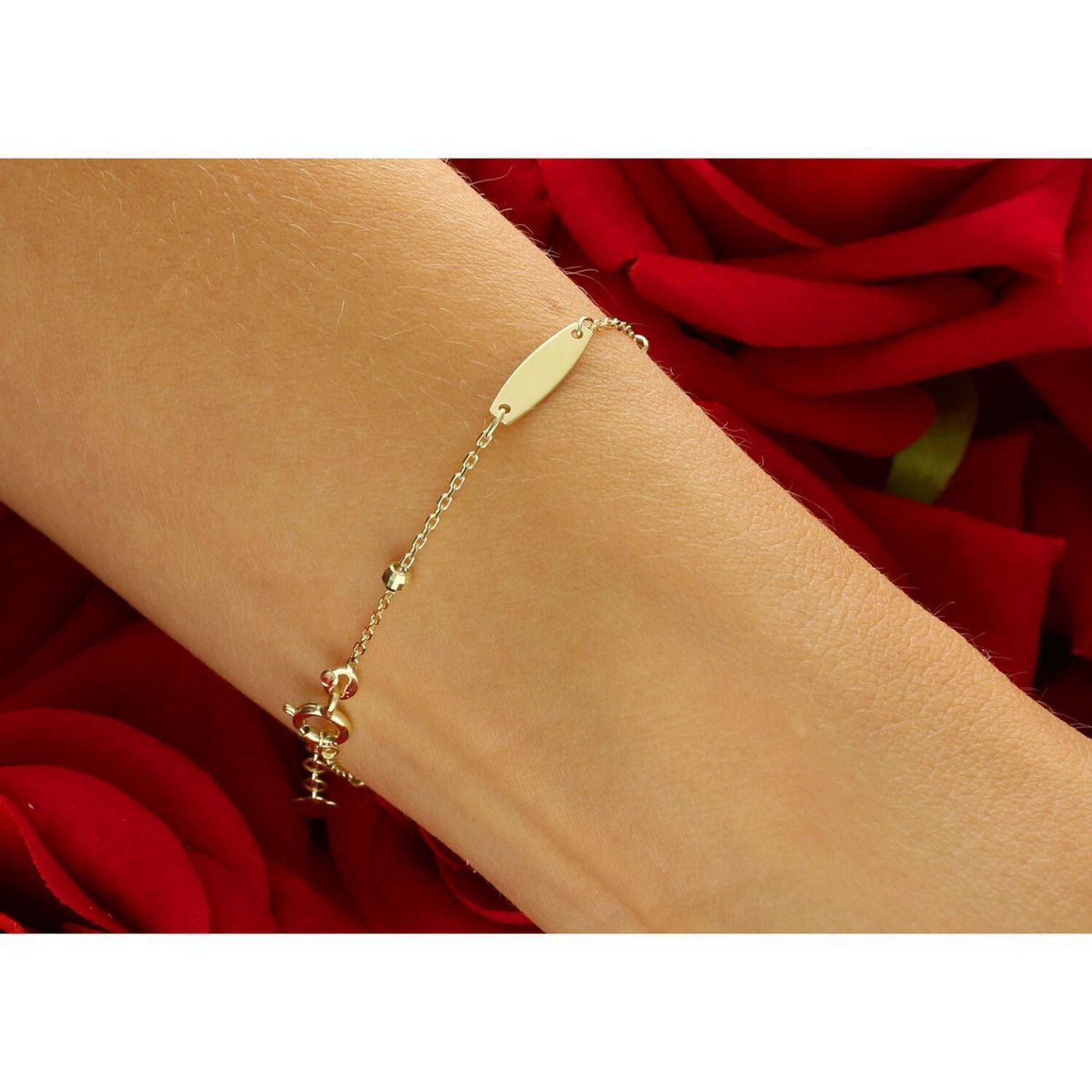 Elegancka złota bransoletka damska próby 585, zdobiona blaszkami podłużnymi i kuleczkami. Długość regulowana 16,5 cm + 1,5 cm, waga 1,48 g, zapięcie na karabińczyk. Idealna do codziennych 1.jpg